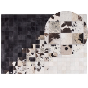 Dywany - Beliani Dywan skórzany biało-czarny 160 x 230 cm KEMAH - miniaturka - grafika 1