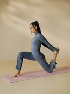 Spodnie sportowe damskie - 4F Spodnie do jogi z rozszerzanymi nogawkami damskie - niebieskie XS - miniaturka - grafika 1