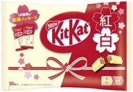 Kuchnie świata - KitKat Mini New Year Edition mleczna i biała czekolada 10 sztuk 116g - Nestl - miniaturka - grafika 1