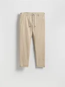 Spodnie męskie - Reserved - Bawełniane spodnie chino slim - beżowy - miniaturka - grafika 1