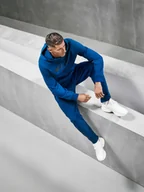 Spodnie sportowe męskie - 4F Spodnie dresowe joggery męskie 4F x Robert Lewandowski - granatowe XXL - miniaturka - grafika 1