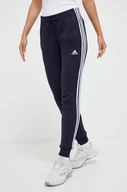Spodnie damskie - adidas spodnie dresowe bawełniane kolor granatowy z aplikacją - miniaturka - grafika 1