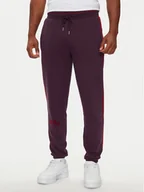 Spodnie sportowe męskie - Puma Spodnie dresowe T7 PLAY.PARIS 626768 44 Bordowy Regular Fit - miniaturka - grafika 1