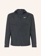 Kurtki i kamizelki sportowe męskie - Nike Kurtka Do Biegania Imp Lght Windrnner schwarz - miniaturka - grafika 1