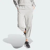 Spodnie rowerowe - adidas Damskie spodnie Essentials 3 paski nadruk zwierzęcy 7/8 - miniaturka - grafika 1