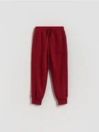 Spodnie i spodenki dla chłopców - Reserved - Dzianinowe joggery - czerwony - miniaturka - grafika 1