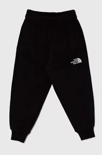 Spodnie i spodenki dla dziewczynek - The North Face spodnie dresowe bawełniane dziecięce OVERSIZED JOGGERS kolor czarny gładkie - grafika 1