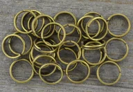 Biżuteria - akcesoria - [101002] Ogniwka sprężynki okrągłe 7mm brąz 100szt - miniaturka - grafika 1