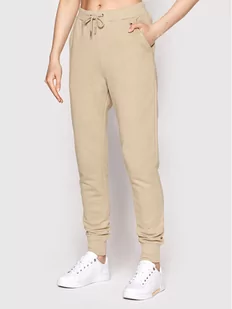 Tommy Hilfiger Spodnie dresowe Graphic WW0WW33509 Beżowy Regular Fit - Spodnie sportowe damskie - miniaturka - grafika 1