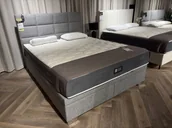 Dom i wnętrze OUTLET - Łóżko kontynentalne 101 z pojemnikiem 160x200 z ekspozycji Salonu Józefów - miniaturka - grafika 1