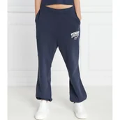Dresy damskie - Tommy Jeans Spodnie dresowe | flare fit - miniaturka - grafika 1