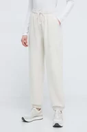 Spodnie damskie - New Balance spodnie dresowe bawełniane kolor beżowy gładkie - miniaturka - grafika 1