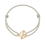 Bransoletki - Bransoletka z pozłacanym okrągłym zapięciem na grubym perłowym sznurku - miniaturka - grafika 1