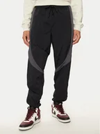 Spodnie sportowe męskie - Nike Spodnie dresowe FN5850 Czarny Regular Fit - miniaturka - grafika 1
