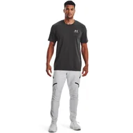 Spodnie sportowe męskie - Męskie spodnie treningowe UNDER ARMOUR UA UNSTOPPABLE CARGO PANTS - białe - miniaturka - grafika 1