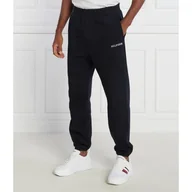 Spodnie sportowe męskie - Tommy Hilfiger Spodnie dresowe MONOTYPE EMBRO SWEATPANT Regular Fit - miniaturka - grafika 1