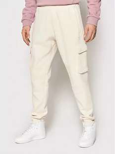 Adidas Spodnie dresowe Essentials HE6991 Beżowy Regular Fit - Spodnie sportowe męskie - miniaturka - grafika 1