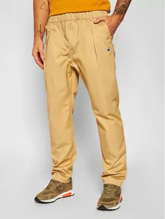 Spodnie męskie - CHAMPION Spodnie materiałowe Tapered Woven 215331 Beżowy Custom Fit - grafika 1