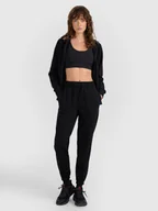 Spodnie sportowe damskie - 4F Spodnie dresowe joggery damskie - czarne XL - miniaturka - grafika 1