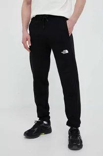 Spodnie męskie - The North Face spodnie dresowe bawełniane kolor czarny gładkie - grafika 1