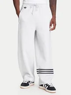 Spodnie sportowe męskie - adidas Spodnie dresowe Neuclassics JW5443 Szary Loose Fit - miniaturka - grafika 1
