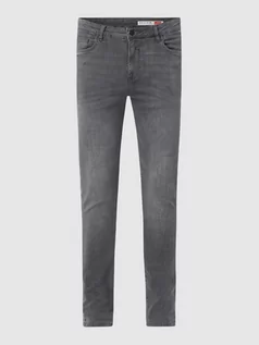 Spodnie męskie - Jeansy o kroju skinny fit z naszywką z logo - grafika 1