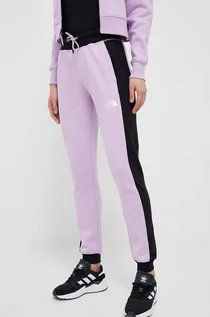Spodnie damskie - The North Face spodnie dresowe bawełniane kolor fioletowy gładkie - grafika 1