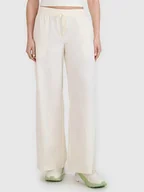 Spodnie sportowe damskie - 4F Spodnie w kolorze kremowym - miniaturka - grafika 1