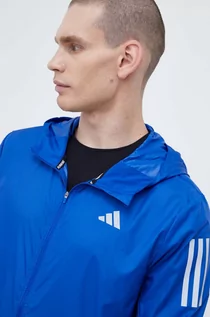 Kurtki męskie - adidas Performance wiatrówka Own the Run kolor niebieski przejściowa - grafika 1