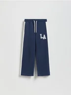 Spodnie i spodenki dla dziewczynek - Reserved - Spodnie dresowe z lampasem - granatowy - miniaturka - grafika 1