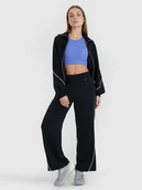 Spodnie sportowe damskie - 4F Spodnie dresowe z modalem damskie 4F x Anna Lewandowska - czarne XL - miniaturka - grafika 1