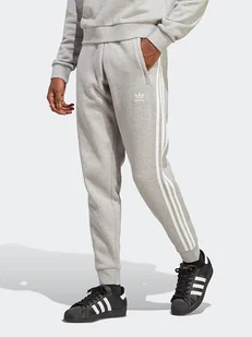 adidas Spodnie dresowe w kolorze szarym - Spodnie sportowe męskie - miniaturka - grafika 1