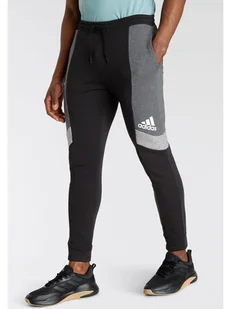 adidas Spodnie dresowe w kolorze czarnym - Spodnie sportowe męskie - miniaturka - grafika 1