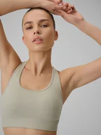Bielizna sportowa damska - 4F Biustonosz treningowy bezszwowy z niskim wsparciem damski - beżowy XS/S - miniaturka - grafika 1