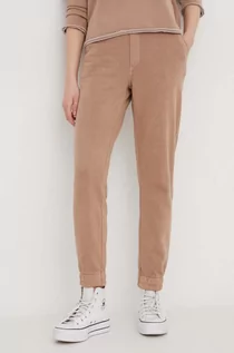 Spodnie damskie - Roxy spodnie dresowe kolor beżowy gładkie - grafika 1