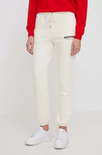 Spodnie damskie - Tommy Hilfiger spodnie dresowe bawełniane kolor beżowy z nadrukiem - grafika 1