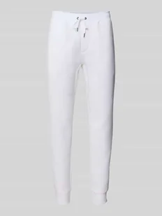 Spodnie dresowe o kroju slim fit z tunelem - Spodnie sportowe męskie - miniaturka - grafika 1