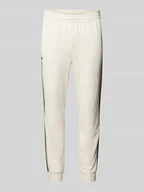 Spodnie sportowe męskie - Spodnie dresowe o kroju slim fit z elastycznym pasem - miniaturka - grafika 1