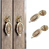 Zawiasy, okucia i inne akcesoria - Uchwyty meblowe - do szuflad, szafek - stop cynku - 2 sztuki - 85 mm - wzór złoty - miniaturka - grafika 1