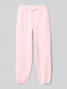 Spodnie dresowe z wpuszczanymi kieszeniami i elastycznym pasem - Spodnie i spodenki dla chłopców - miniaturka - grafika 1