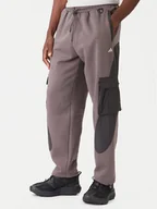 Spodnie sportowe męskie - adidas Spodnie dresowe JV8022 Brązowy Regular Fit - miniaturka - grafika 1