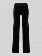 Spodnie damskie - Spodnie typu track pants o kroju regular fit z nakładanymi kieszeniami - miniaturka - grafika 1