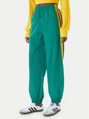 Spodnie sportowe damskie - adidas Spodnie dresowe Sport Santiago KD2971 Zielony Loose Fit - miniaturka - grafika 1