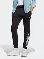 Spodnie sportowe męskie - adidas Spodnie dresowe Essentials Single Jersey Tapered Elasticized Cuff Logo Joggers IC0055 Czarny Regular Fit - miniaturka - grafika 1
