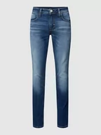 Spodnie męskie - Jeansy o kroju tapered fit z 5 kieszeniami - miniaturka - grafika 1