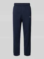 Spodnie sportowe męskie - Spodnie dresowe o kroju regular fit z wyhaftowanym logo - miniaturka - grafika 1