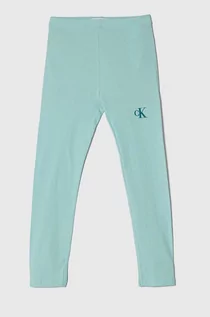 Spodnie i spodenki dla dziewczynek - Calvin Klein Jeans legginsy dziecięce kolor turkusowy z nadrukiem - grafika 1