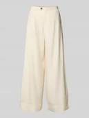 Spodnie damskie - Spodnie z zakładkami w pasie, szerokimi nogawkami i wpuszczanymi kieszeniami model ‘NATUK’ - miniaturka - grafika 1