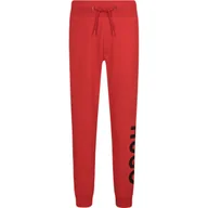 Spodnie i spodenki dla chłopców - HUGO KIDS Spodnie dresowe | Regular Fit - miniaturka - grafika 1