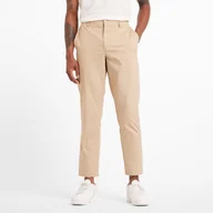 Spodnie męskie - Spodnie męskie New Balance MP43554SOT beżowe - miniaturka - grafika 1